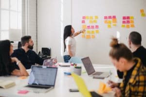 person planning at a whiteboard